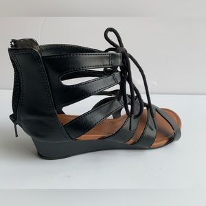 Black American Eagle zippered heel sandal
